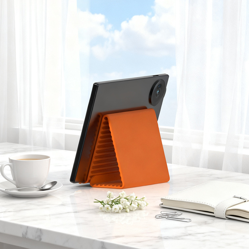 🥳2026 HOT SALE🥳💞50K+ SOLD!🛋️✨ 50% OFF! Silicone Foldable Stand – Shape it your way, reduces neck pain. Ultra‑portable, anti‑slip. Work, cook or watch hands‑free. A small stand, big relief.📱🛡️