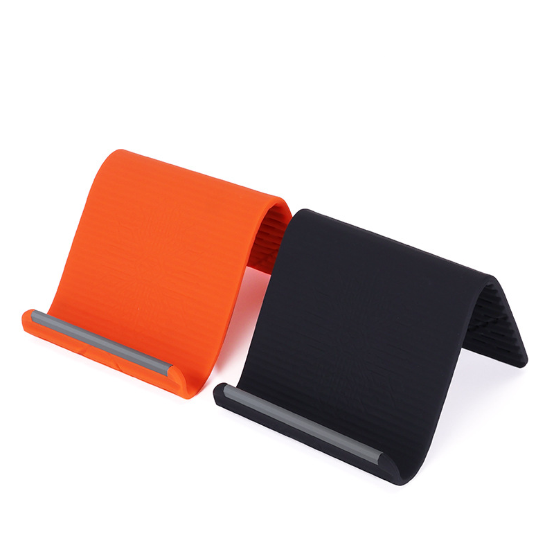 🥳2026 HOT SALE🥳💞50K+ SOLD!🛋️✨ 50% OFF! Silicone Foldable Stand – Shape it your way, reduces neck pain. Ultra‑portable, anti‑slip. Work, cook or watch hands‑free. A small stand, big relief.📱🛡️
