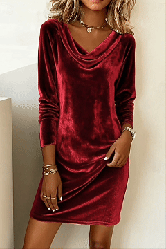 This women's velvet dress with a cowl neck exudes elegance and sophistication.