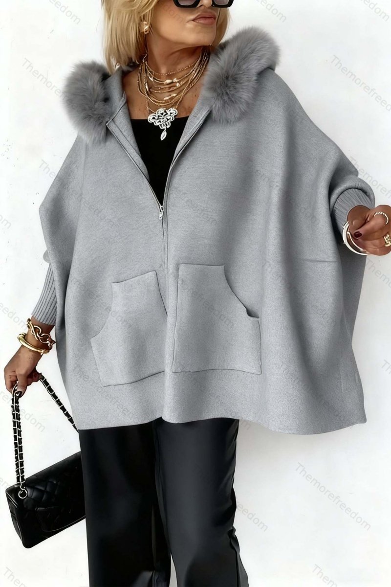 Women's fashionable loose-fitting knitted hooded jacket with pockets and a large fur collar