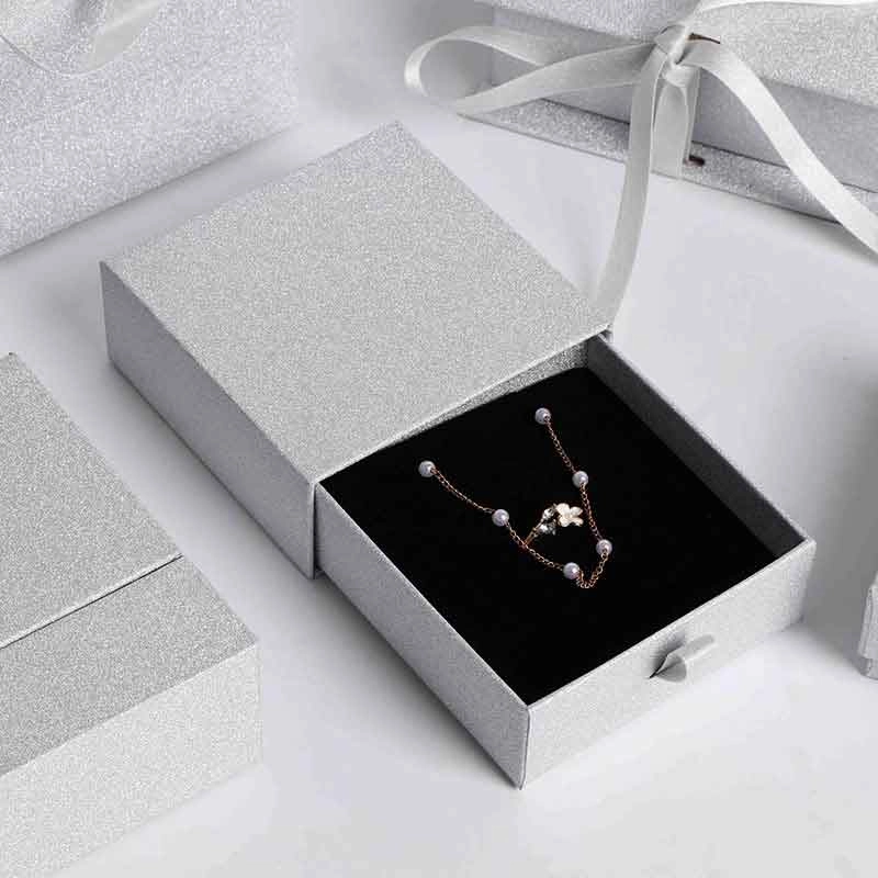 Drawer jewelry box with ribbon pull