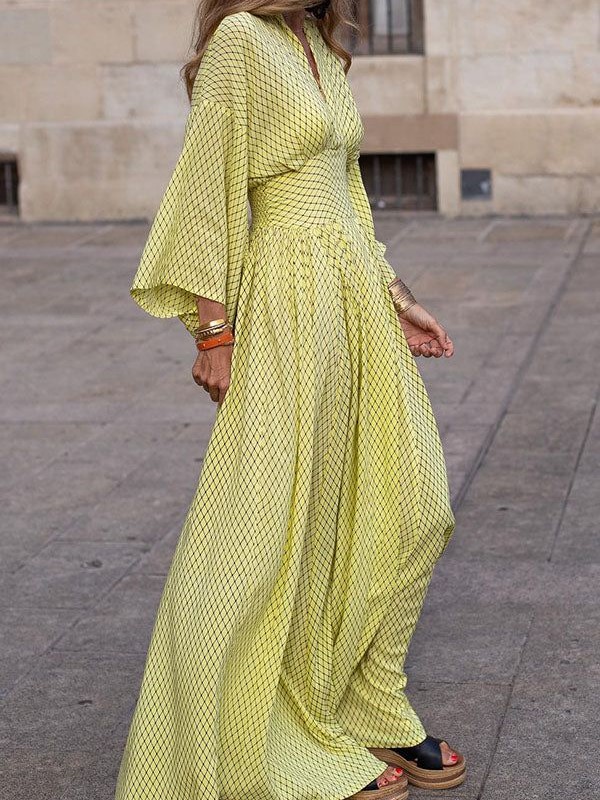 Flowy Printed Maxi Dress with Smocked Waist and Flared Sleeves