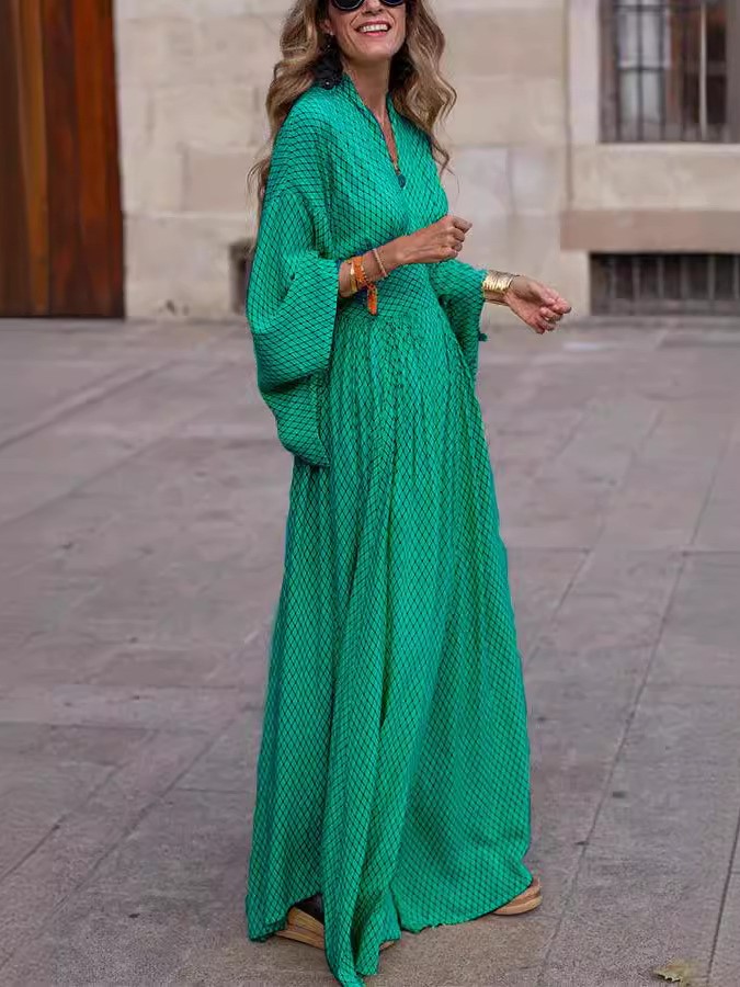 Flowy Printed Maxi Dress with Smocked Waist and Flared Sleeves
