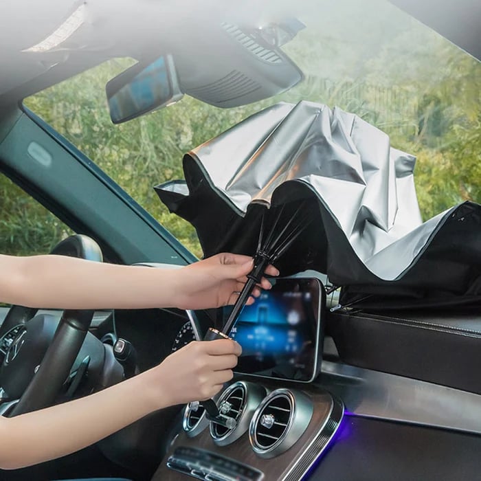 Foldable Windshield Sunshade ☂️ — Protect your car from scorching heat.