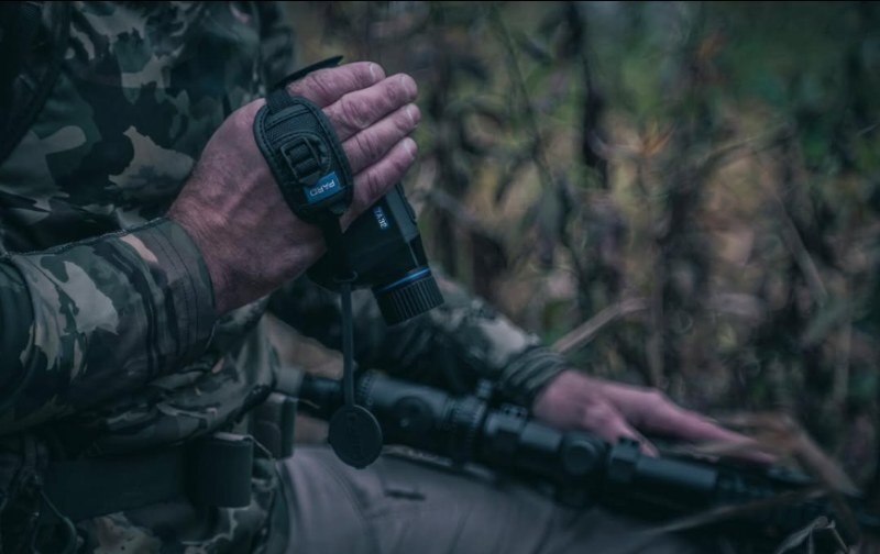Close-up of PARD TA32/62 Thermal Monocular compact body and lens in user&rsquo;s hand.