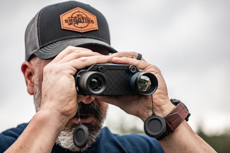 Man glassing through Harrier Thermal Imaging Binoculars.
