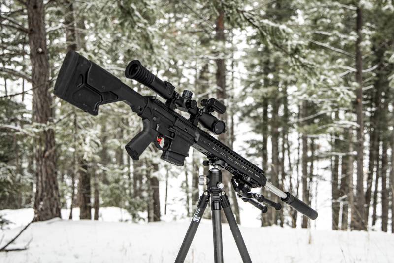 Angled view of mounted Night Stalker 4K Day & Night Vision Rifle Scope.