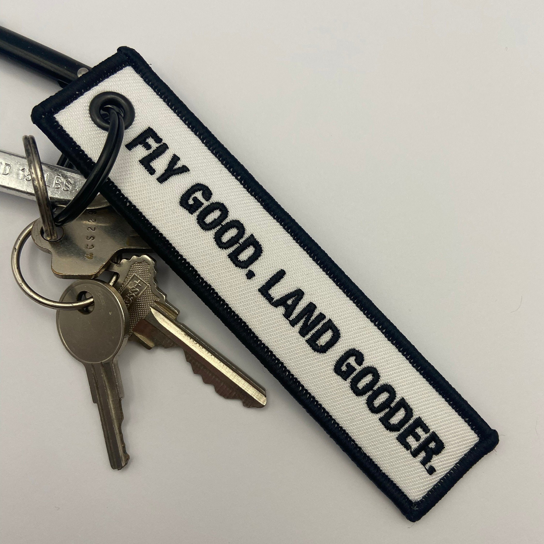 🔥LAST DAY 50% OFF - Fly Good. Land Gooder. Keychain | Aviation Humor