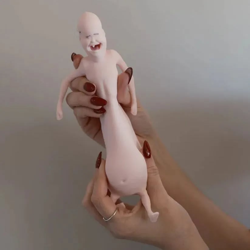 RENE Squishy Doll – Squishy, Laughing Fun!