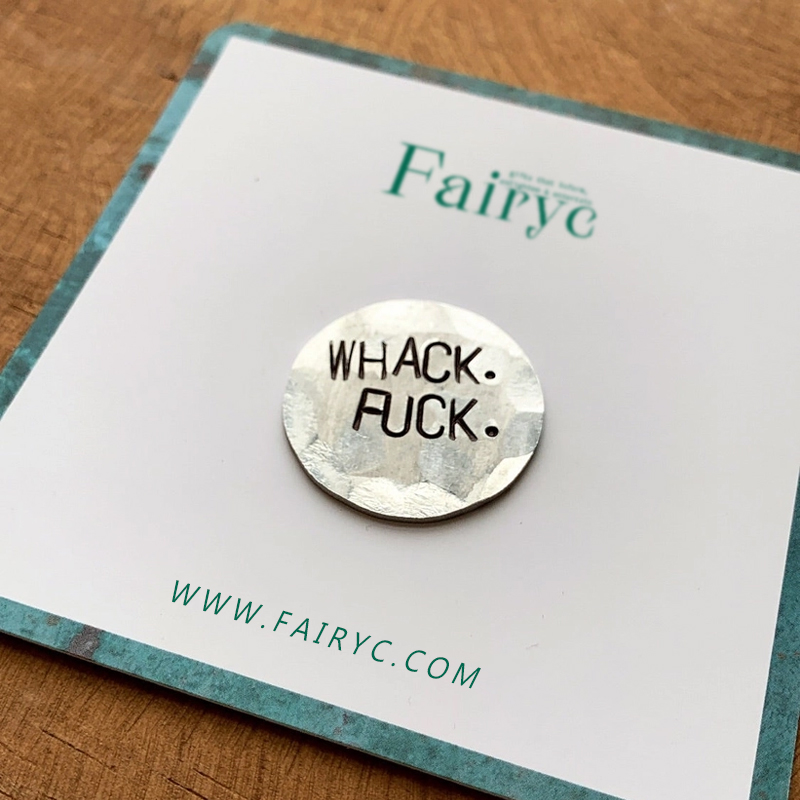 Fun hand embossed golf ball marker
