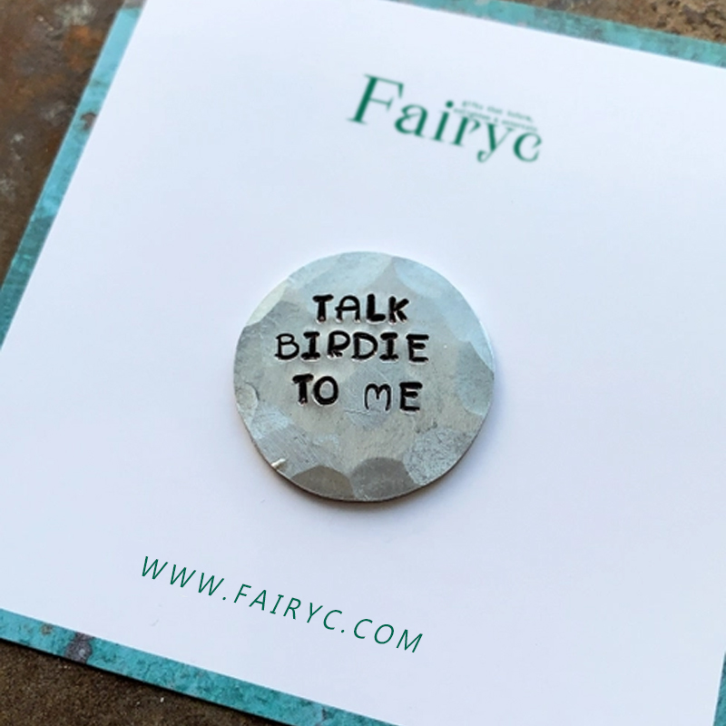 Fun hand embossed golf ball marker