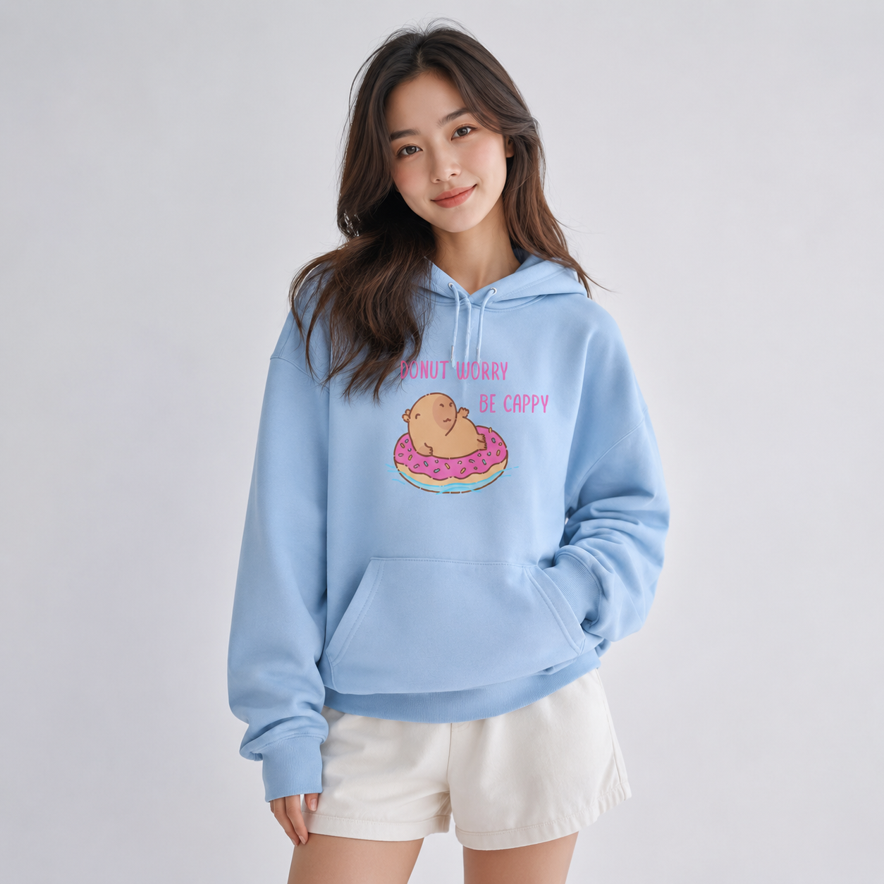 Capybara Floating Donut Don't Worry Be Cappy Unisex Hoodies