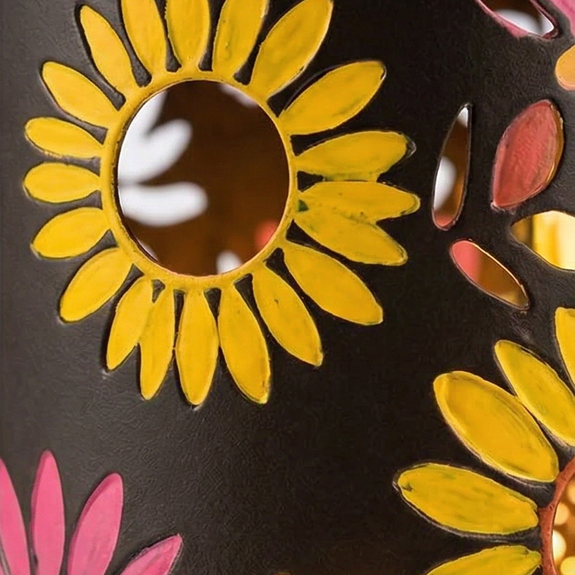 Close-up of the sunflower cutout detail on the lantern