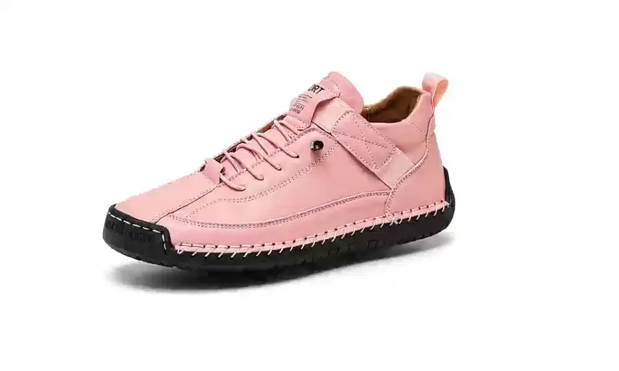 Animated pink Liora sneaker rotating above a blue grid to demonstrate the cushioned sole