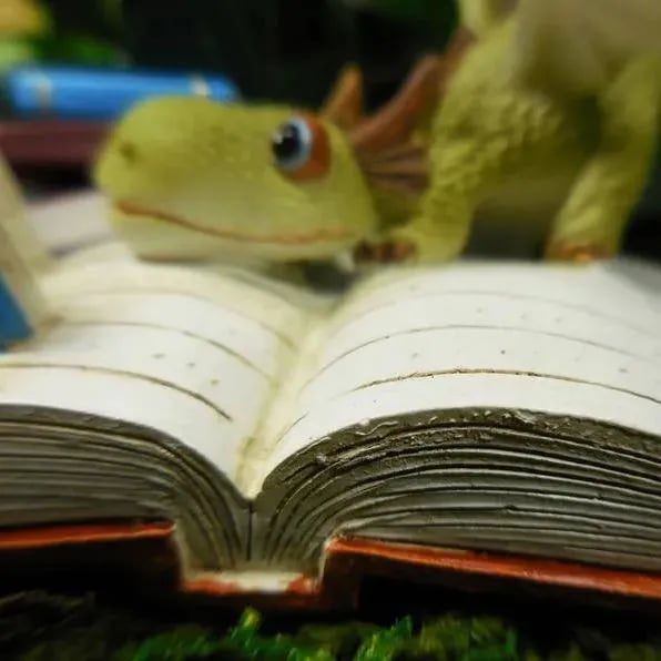 Miniature Green Dragon Reading on Giant Book Figurine