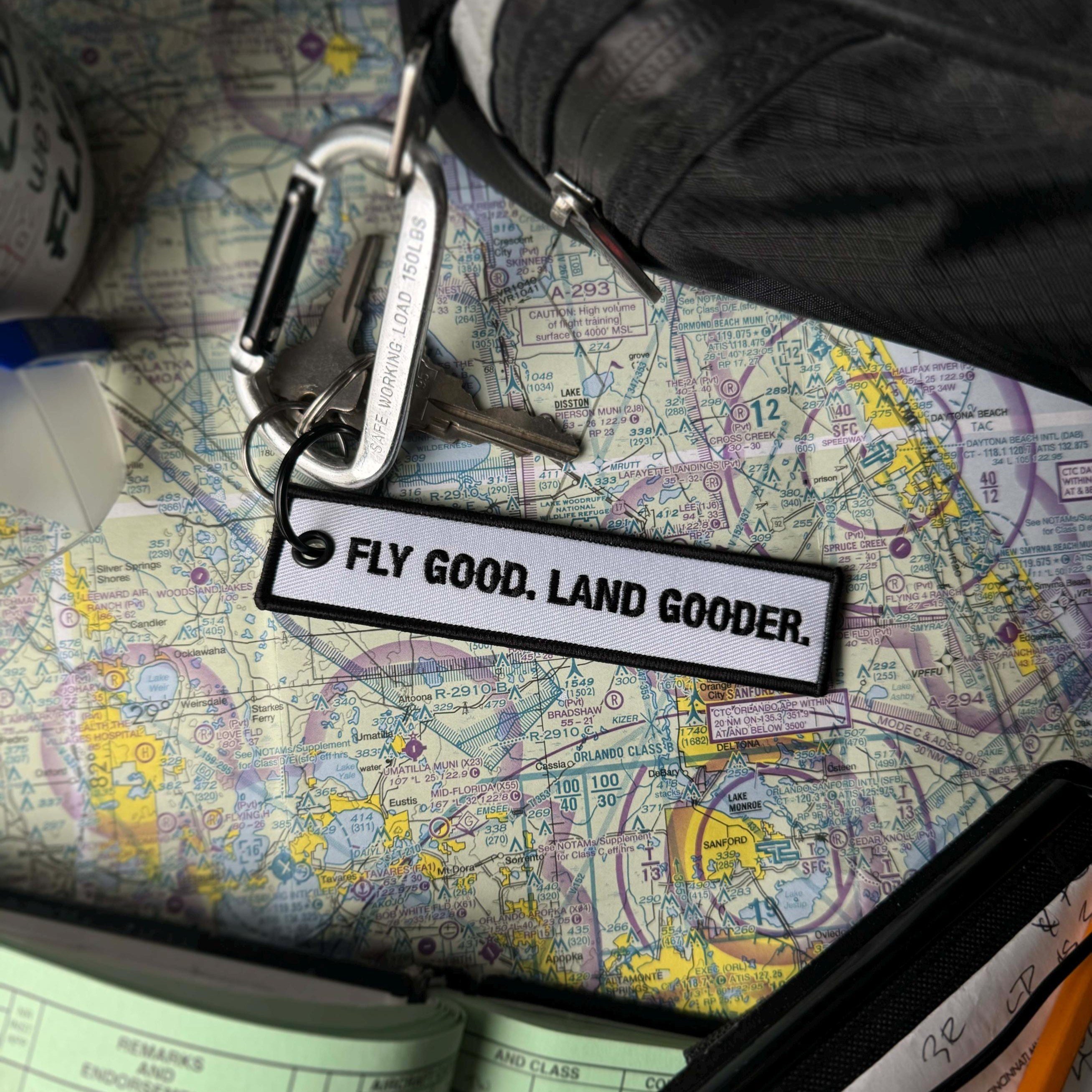 🔥LAST DAY 50% OFF - Fly Good. Land Gooder. Keychain | Aviation Humor
