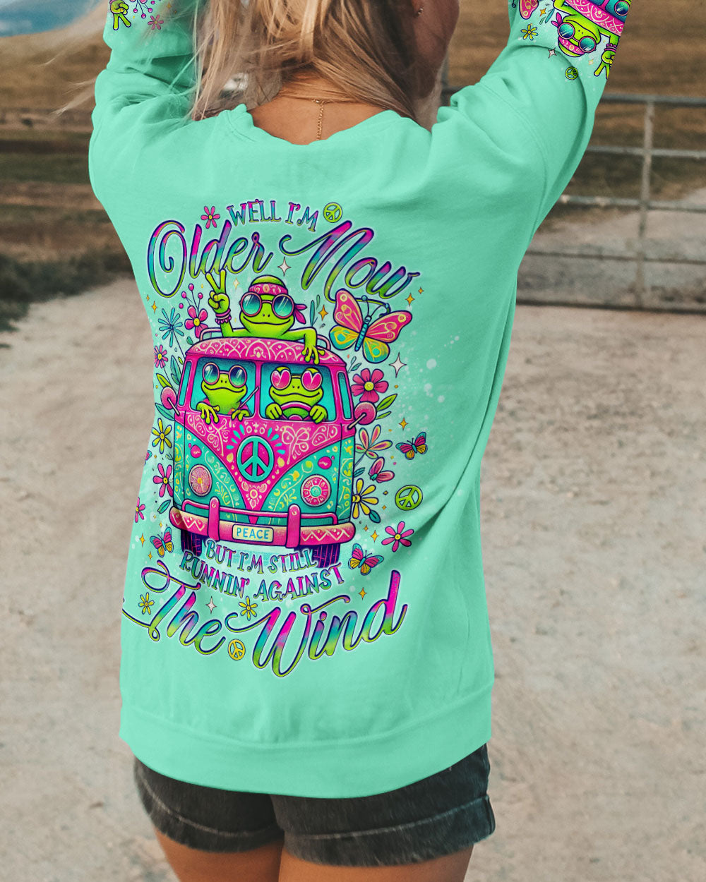 RUNNING AGAINST THE WIND BUS FROG ALL OVER PRINT - TLNO2211243