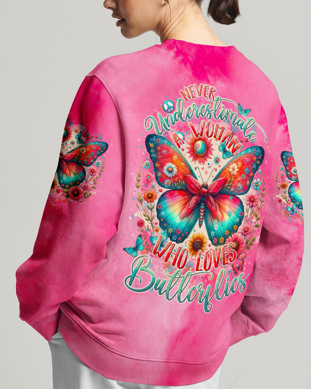 NEVER UNDERESTIMATE A WOMAN WHO LOVES BUTTERFLIES ALL OVER PRINT - TYTD1106244