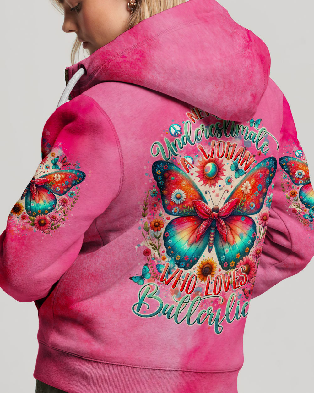 NEVER UNDERESTIMATE A WOMAN WHO LOVES BUTTERFLIES ALL OVER PRINT - TYTD1106244