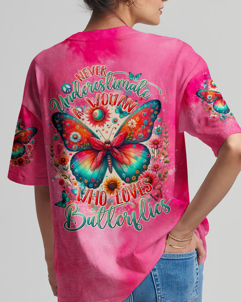NEVER UNDERESTIMATE A WOMAN WHO LOVES BUTTERFLIES ALL OVER PRINT - TYTD1106244