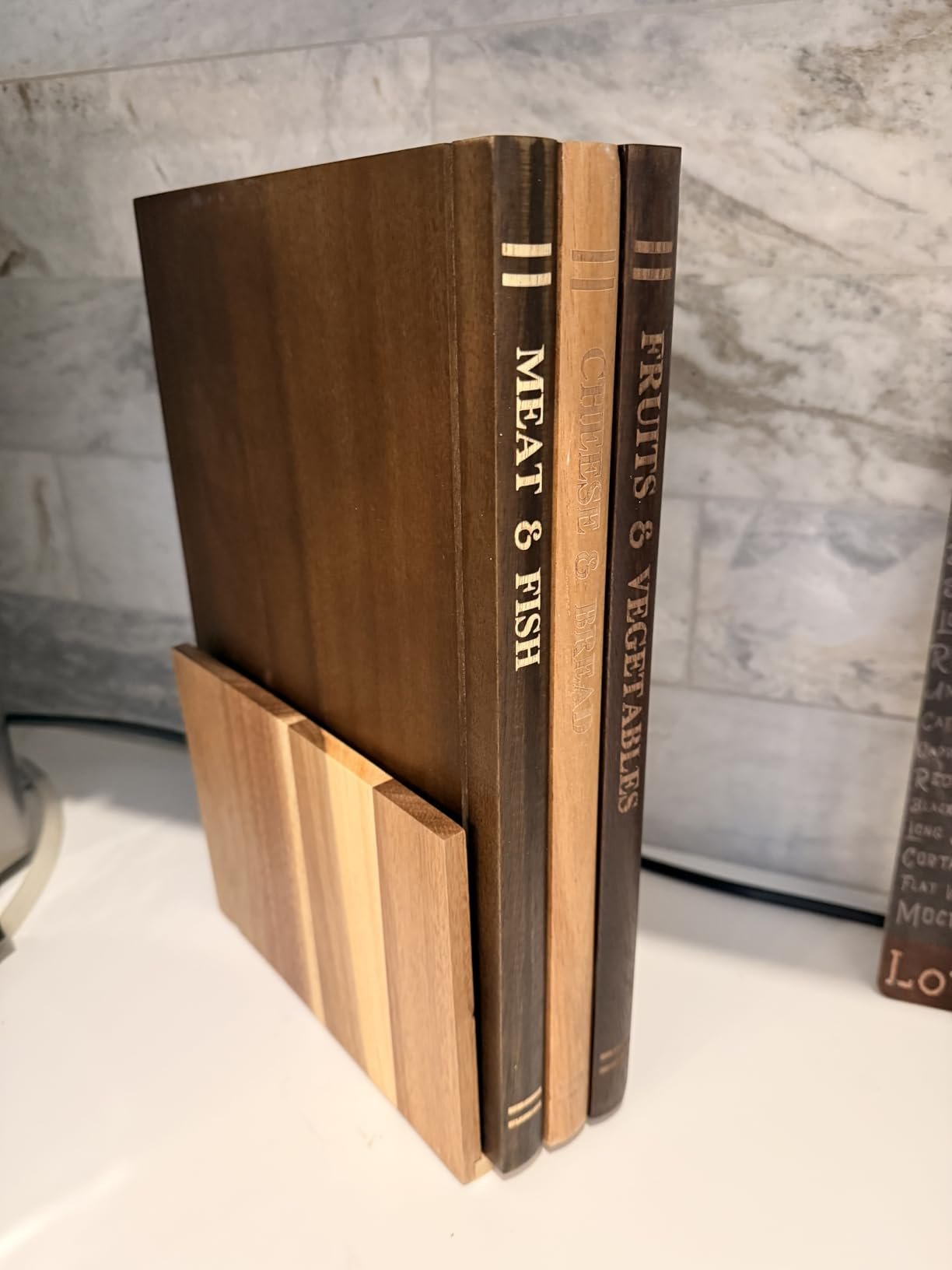 The stand is flimsy but I LOVE this cutting board set.