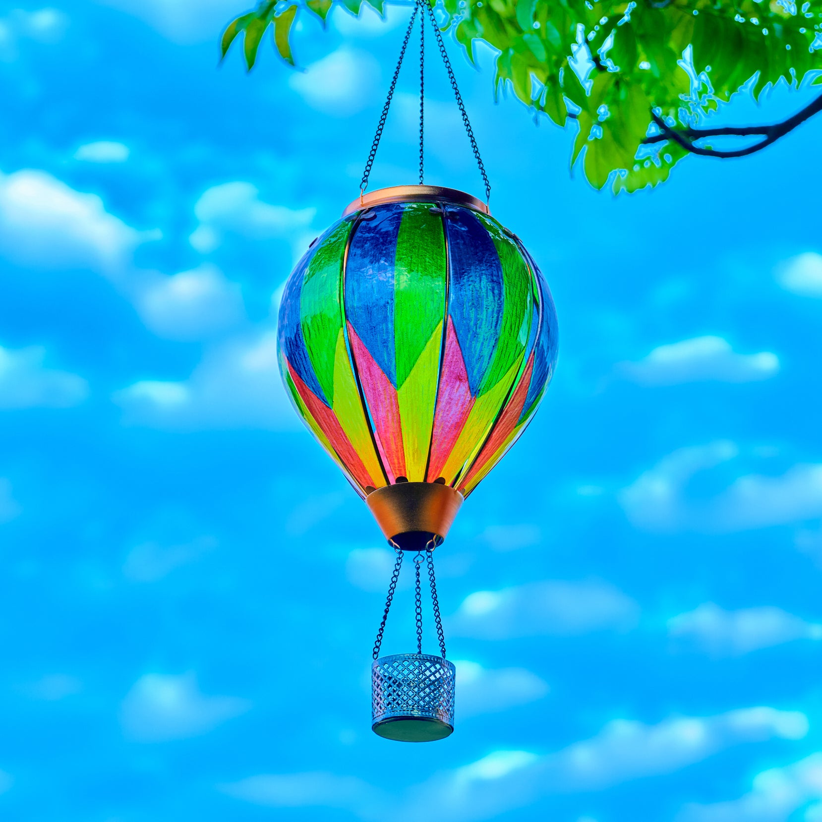 Backyard solar lights featuring a rainbow balloon lantern with gradient hues, great for decorating garden and yard ambiance