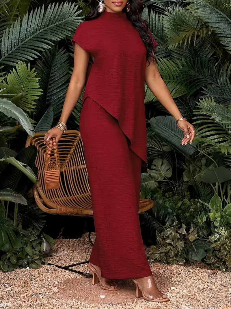 Asymmetrical sleeveless top and pants set in red, bold statement two-piece commuter style