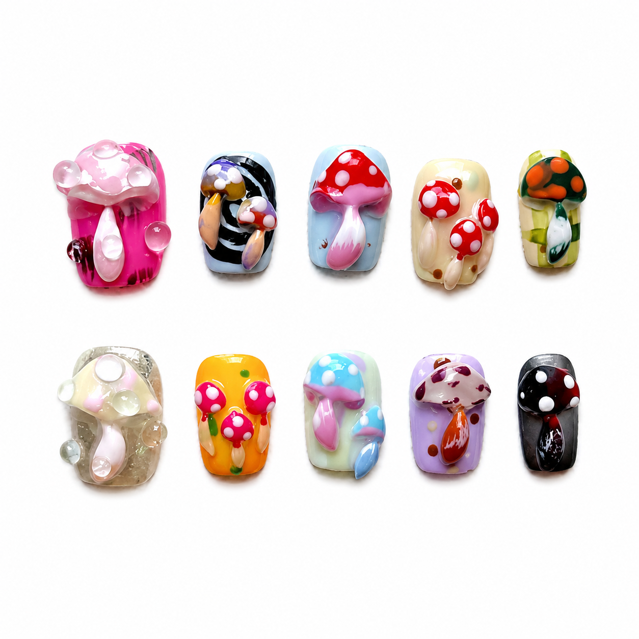 Glossy press-on nails featuring a mismatched multi-color design decorated with hand-painted patterns and colorful 3D jelly mushroom charms with clear water droplets.