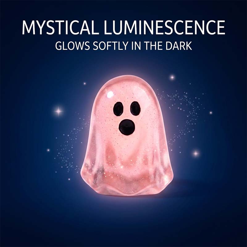 Pink glowing ghost figurine at night