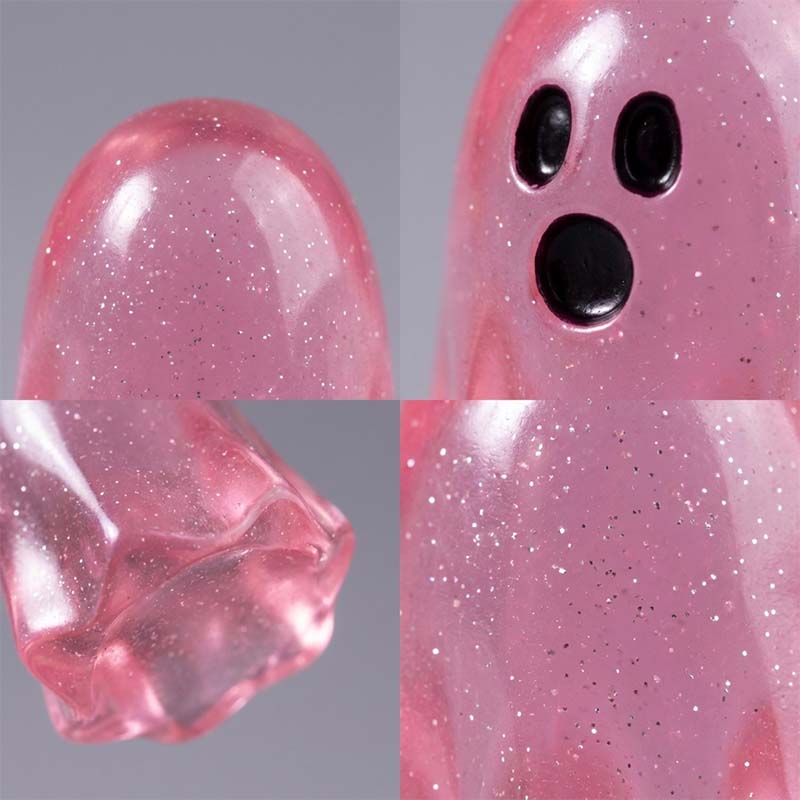 Close up details of pink glow in the dark ghost figurine