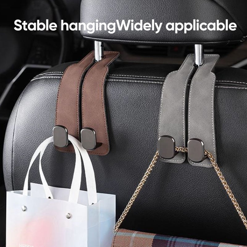 Brown and gray suede car seat hooks holding shopping bags
