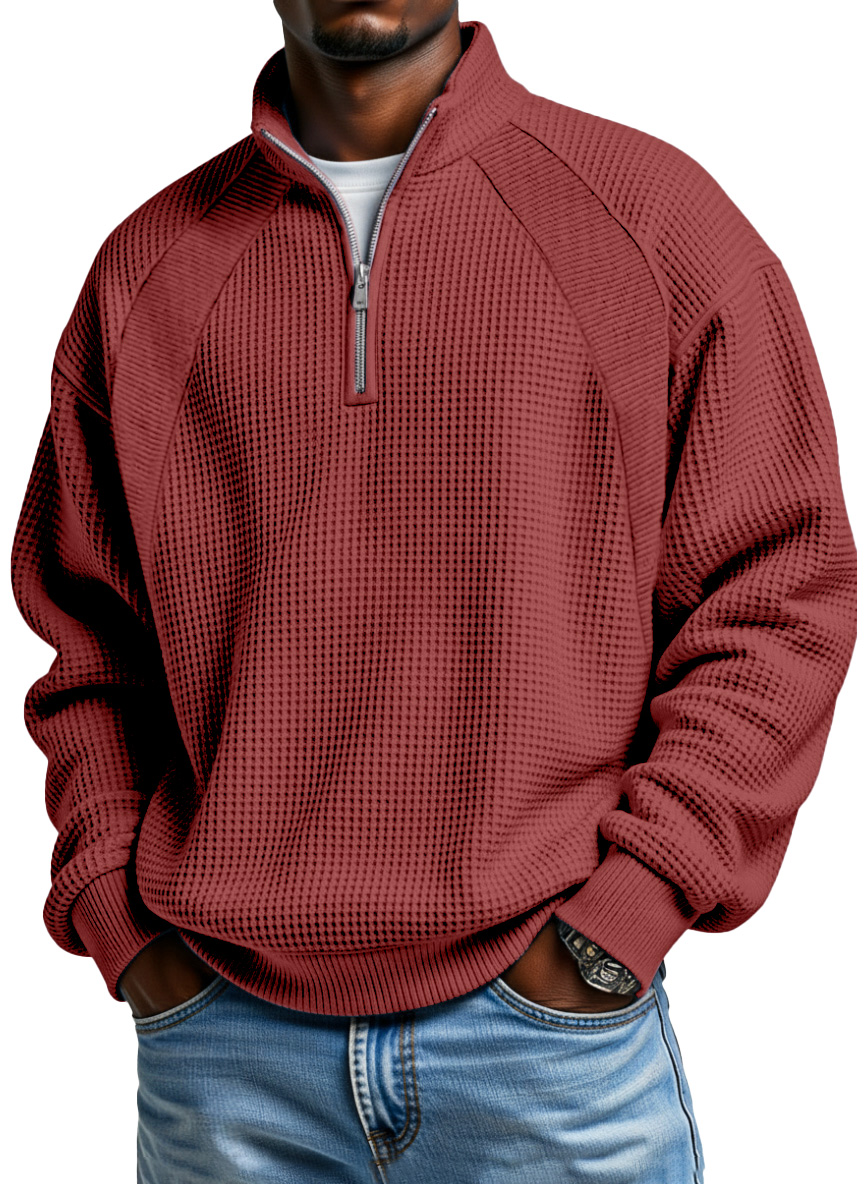 Burgundy men's waffle textured stand collar pullover styled with jeans