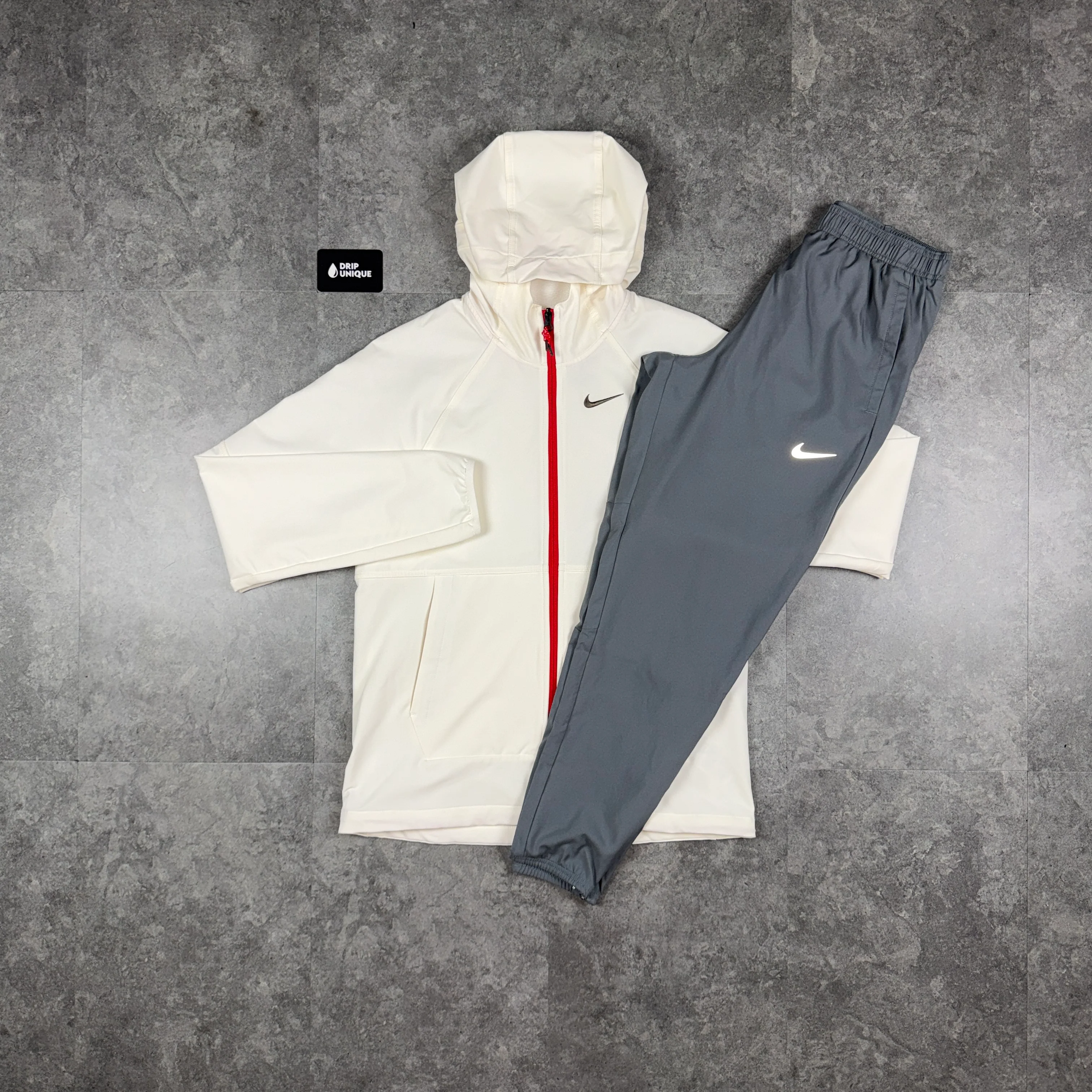 Nike Repel “Just Do It” Windrunner Jacket Chilli Red & Grey Nike Challenger Pants Set