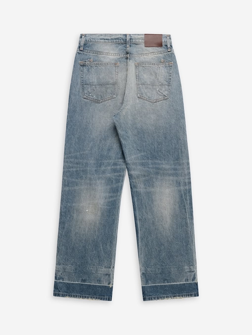 DISTRESSED PATCH JEANS