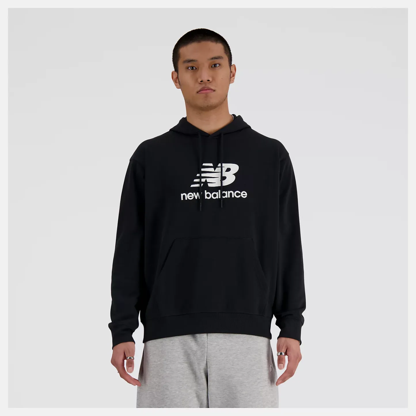 Sport Essentials Stacked Logo スウェットフーディ