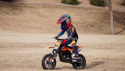 Kid Riding Electric Dirt Bike