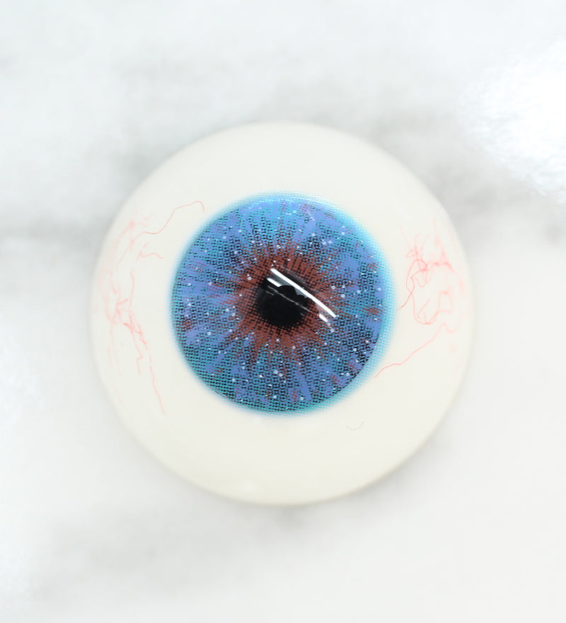 Uris Interstellar blue colored contacts on Dark eye