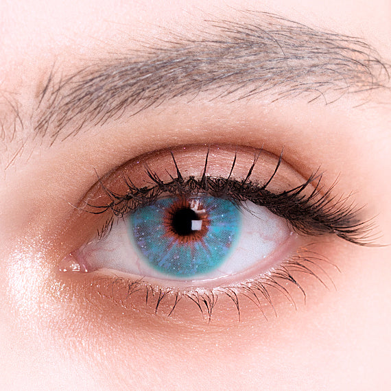 Uris Interstellar blue colored contacts on eye