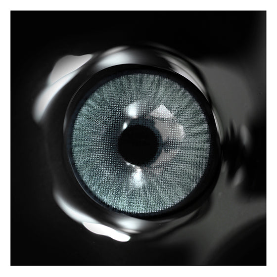 Close up of silicone hydrogel Uris Arctic Grey contact lenses in handpainted design