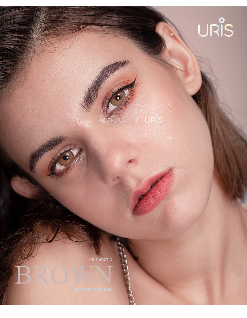 Close up of natural Uris Arctic Brown colored contact lenses on eyes