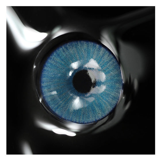 Close up of silicone hydrogel Uris Arctic Blue contact lenses in handpainted design
