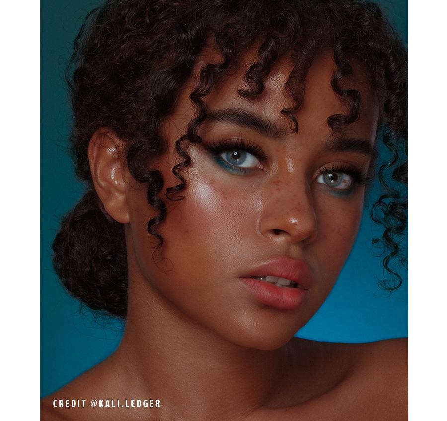 partner wearing Uris Polaris Blue Colored Contacts on dark eyes