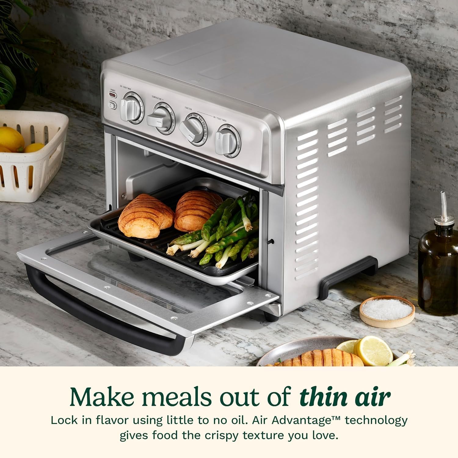 Air fryer oven with 8 functions: air frying, convection, grilling, and keep warm.