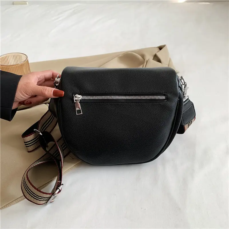 black synthetic leather crossbody bag with adjustable striped strap large capacity shoulder messenger bag for women zipper closure polyester lining versatile solid   details 2