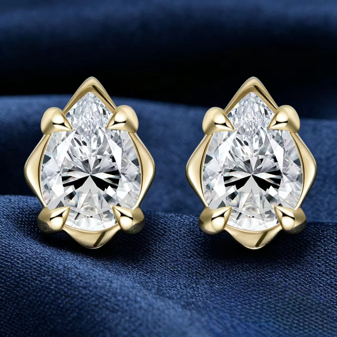 The Lotus Pear Studs
