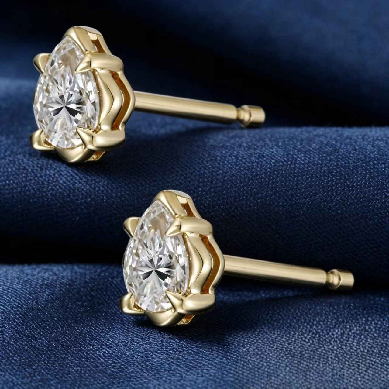 The Lotus Pear Studs