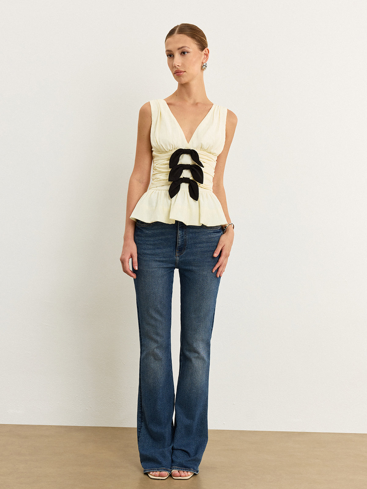 Bow-Detail Ruched Top with Peplum Hem-Massicos