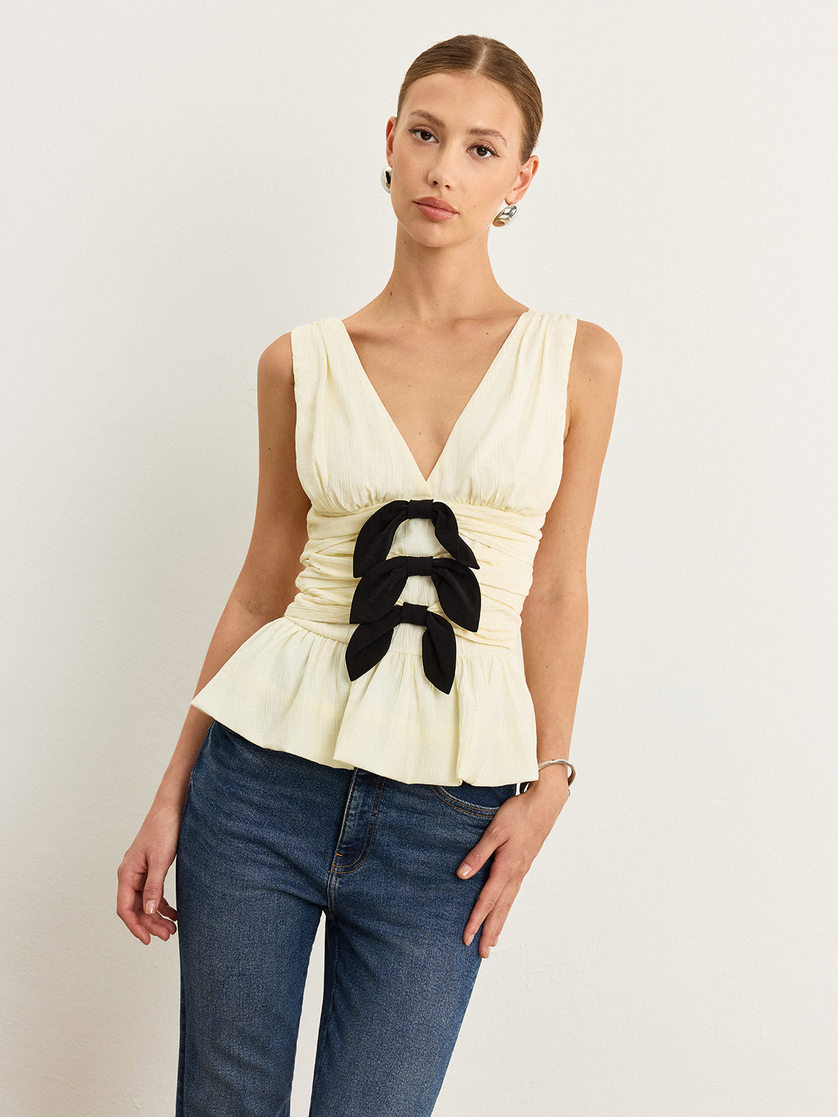 Bow-Detail Ruched Top with Peplum Hem-Massicos