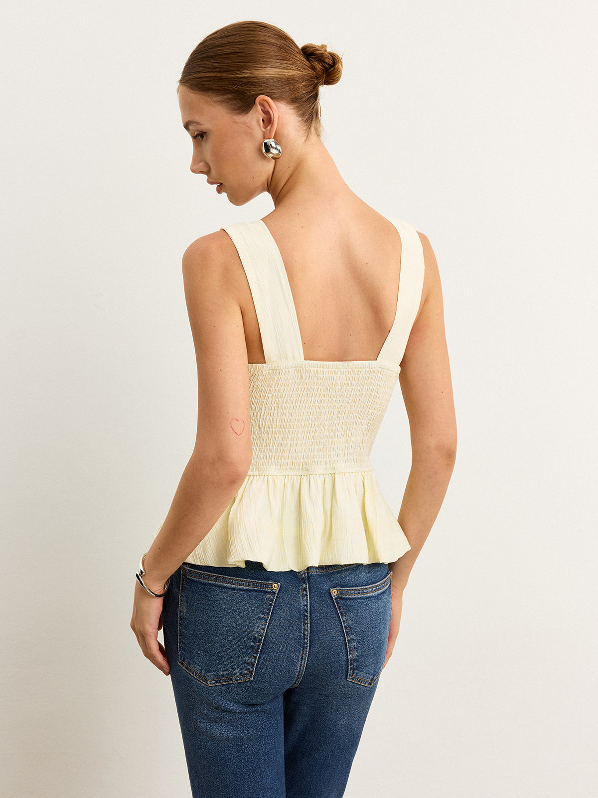 Bow-Detail Ruched Top with Peplum Hem-Massicos