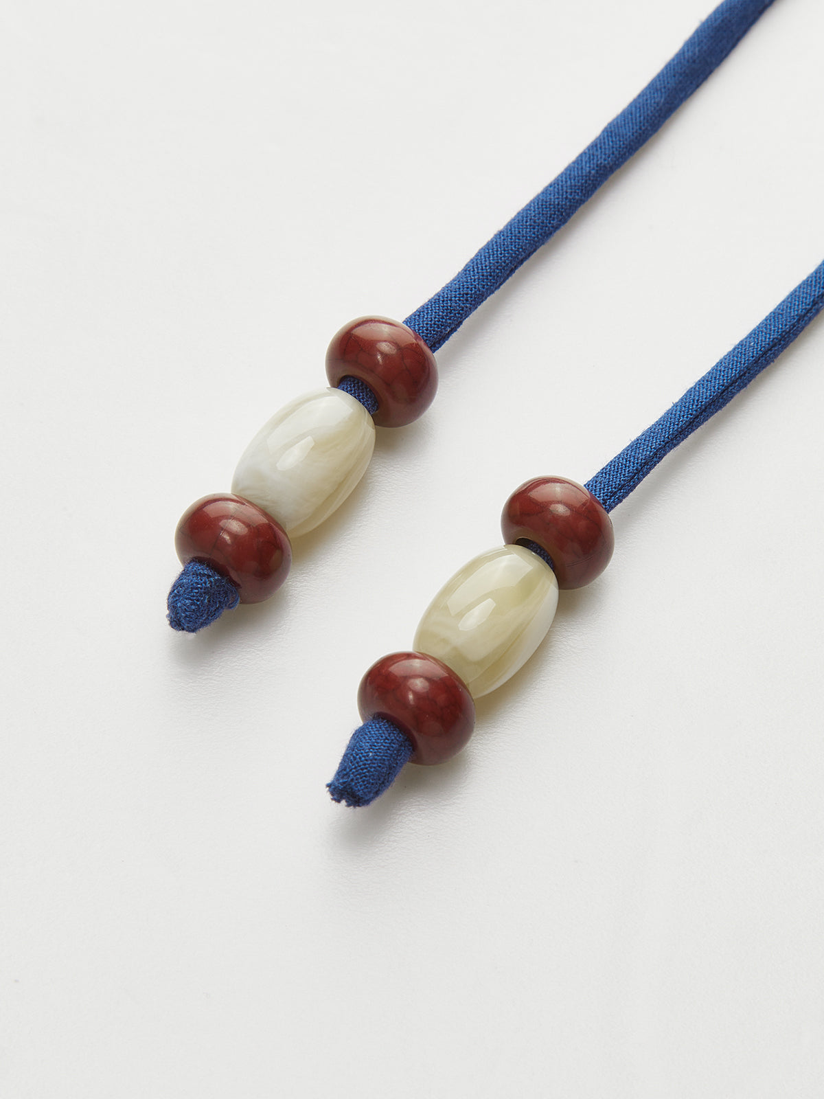 Asymmetric Wrap-Tie Sleeveless Top with Beaded String-Massicos